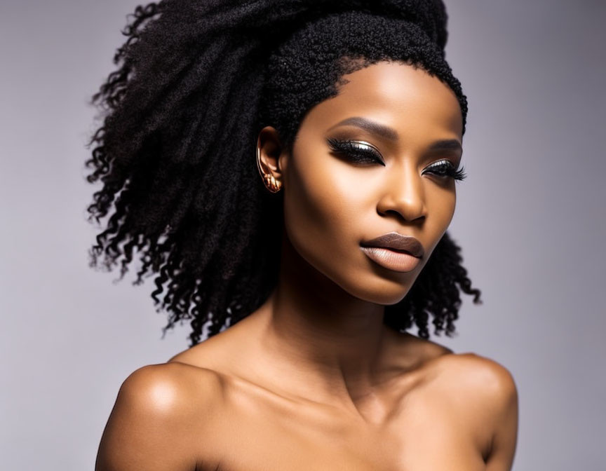 Woman with Long Black Dreadlocks and Striking Makeup on Gray Background