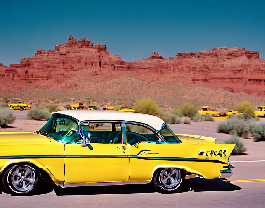 Classic Yellow Car Driving on Desert Road with Parked Cars