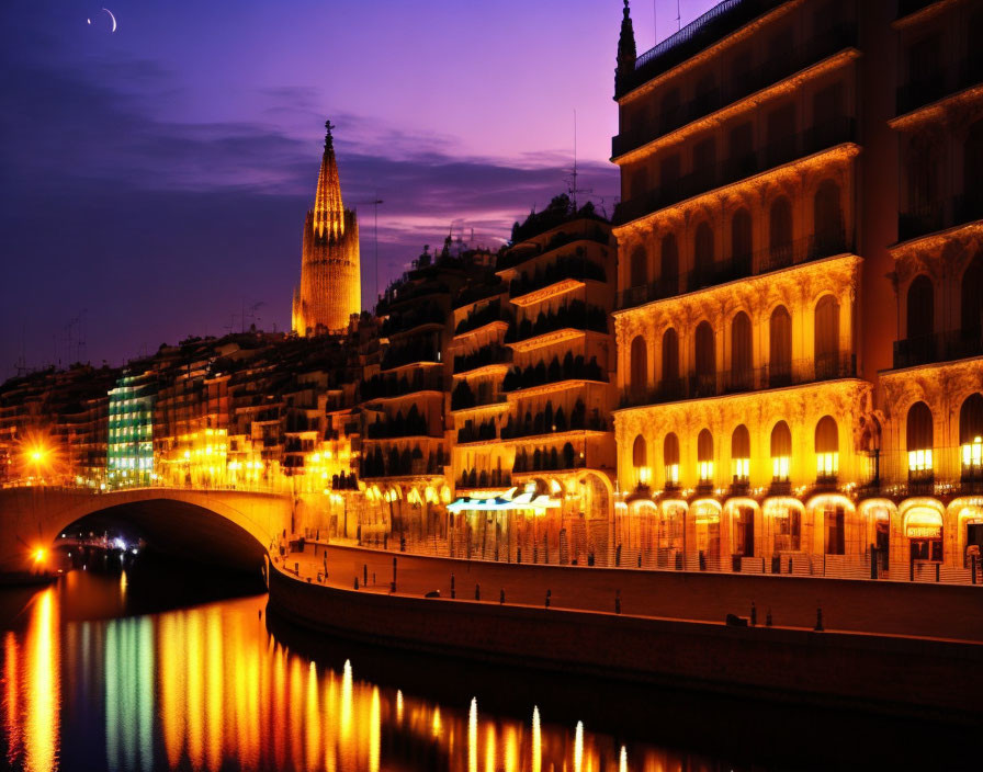 Cityscape with illuminated buildings, crescent moon, and warm reflections on river.