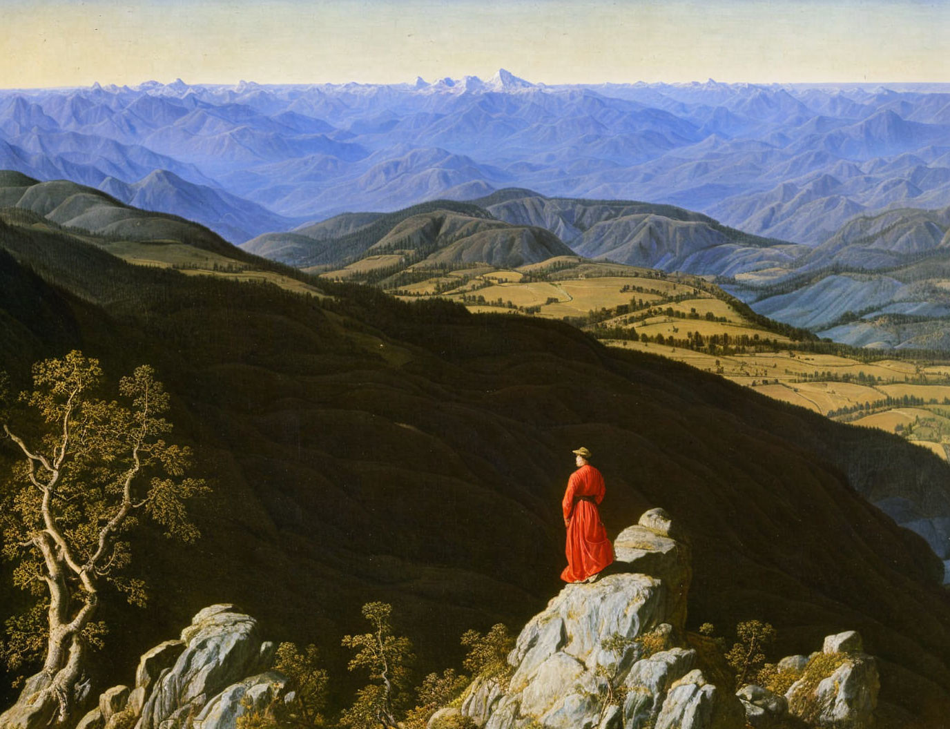 Person in Red Cloak Observing Mountain Landscape