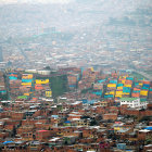 Densely packed cityscape with buildings under hazy sky