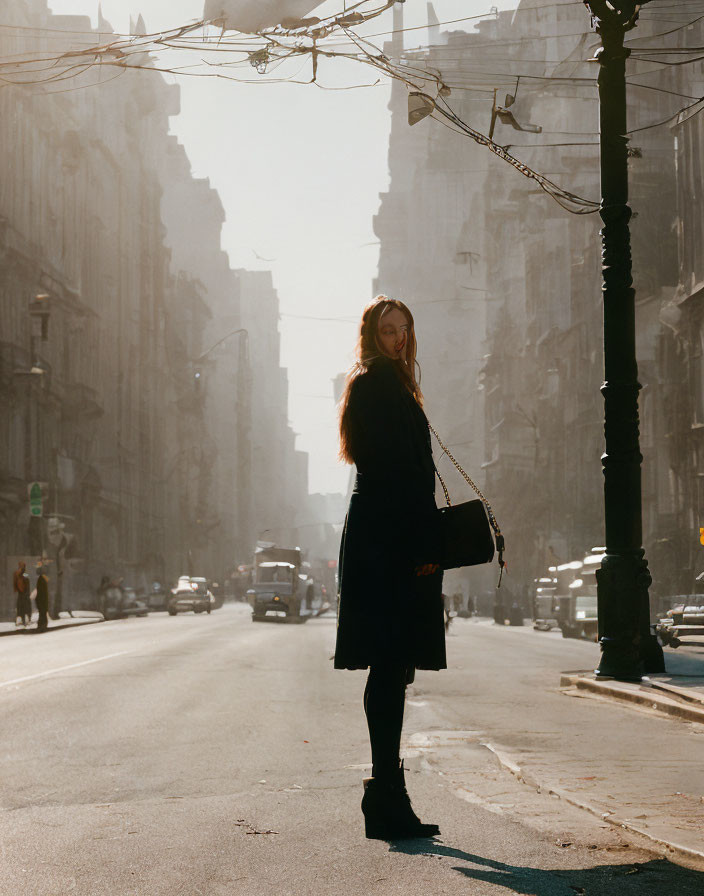 Urban street scene with person casting shadow in sunlight