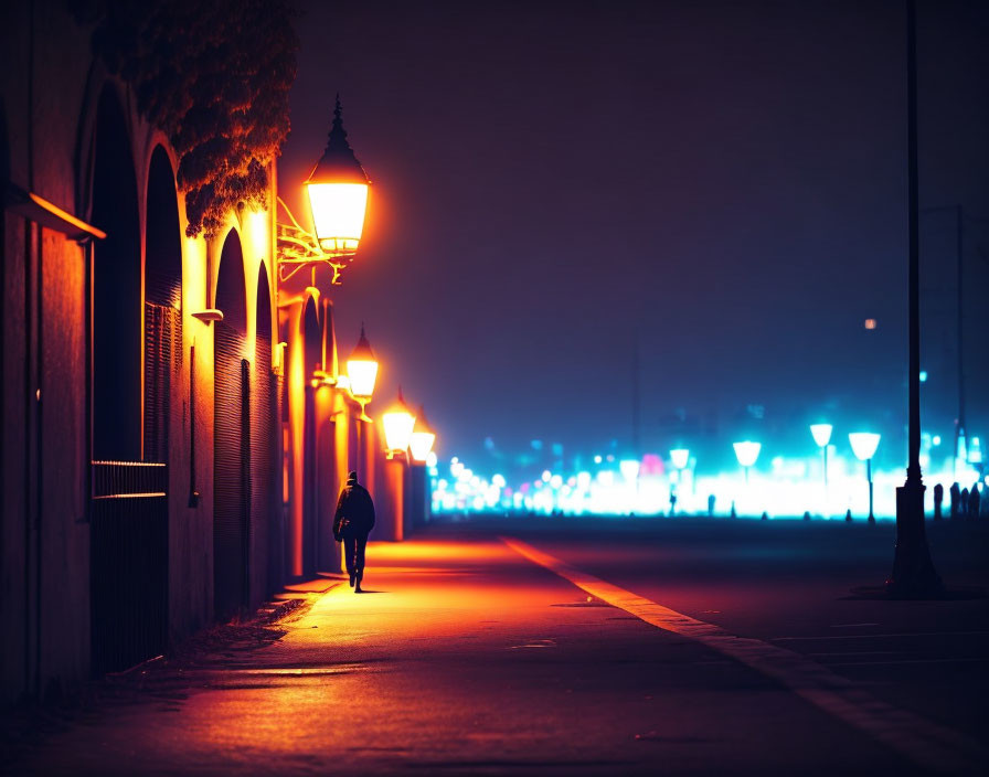 Nighttime street scene with solitary figure under glowing street lamps