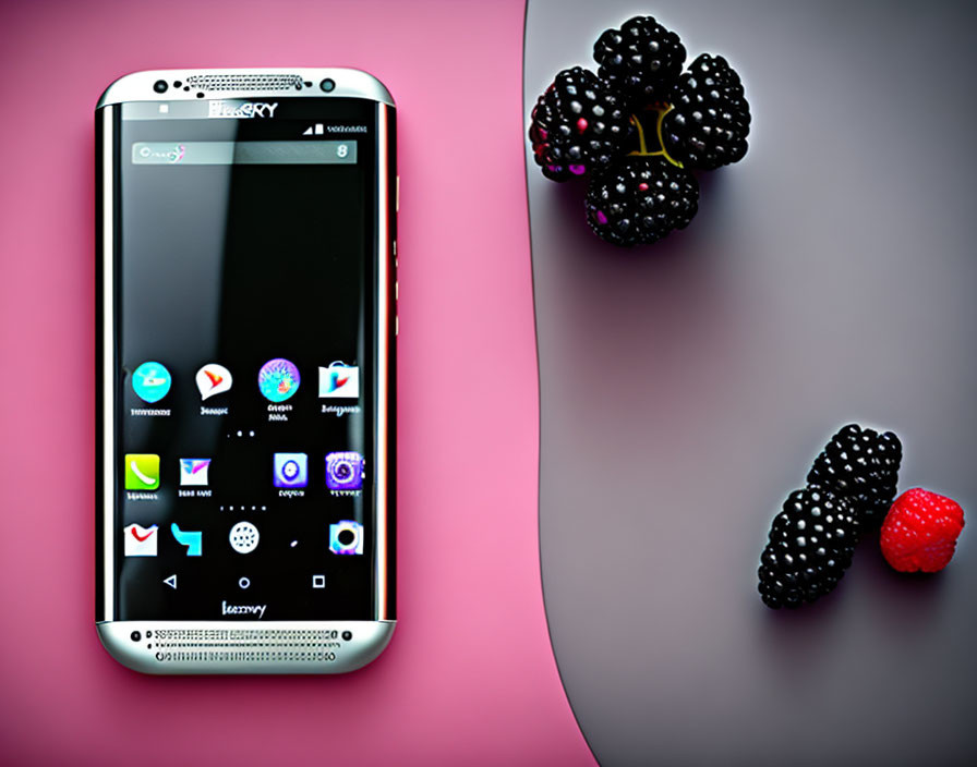 Colorful Smartphone Screen with Berries on Pink Surface