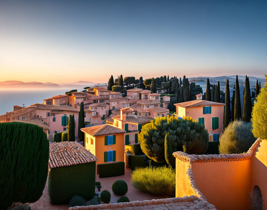 Tranquil Coastal Village Sunset with Terracotta-Roofed Houses
