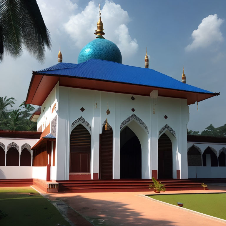 White Mosque with Blue Dome and Gold Minarets in Green Landscape