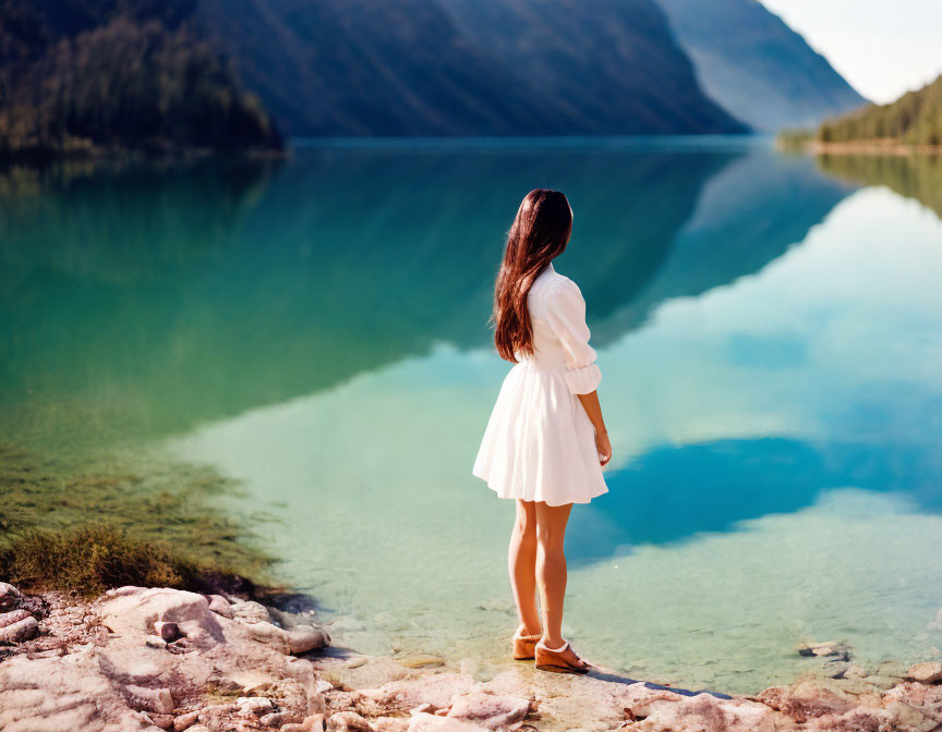 Woman in White Dress by Serene Mountain Lake