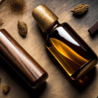 Amber glass bottles with wooden caps on dark surface and golden leaves