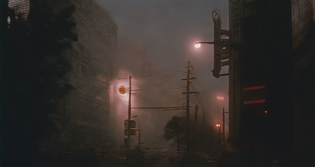 Dystopian cityscape at night: fog, neon signs, deserted street.