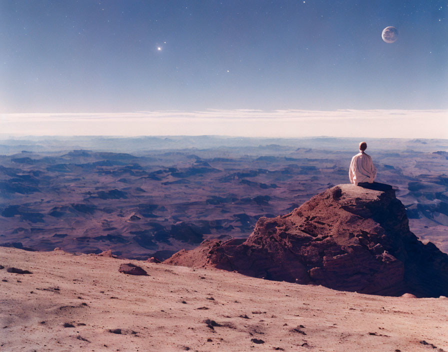 Person sitting on rocky outcrop gazes at Mars-like landscape under twilight sky