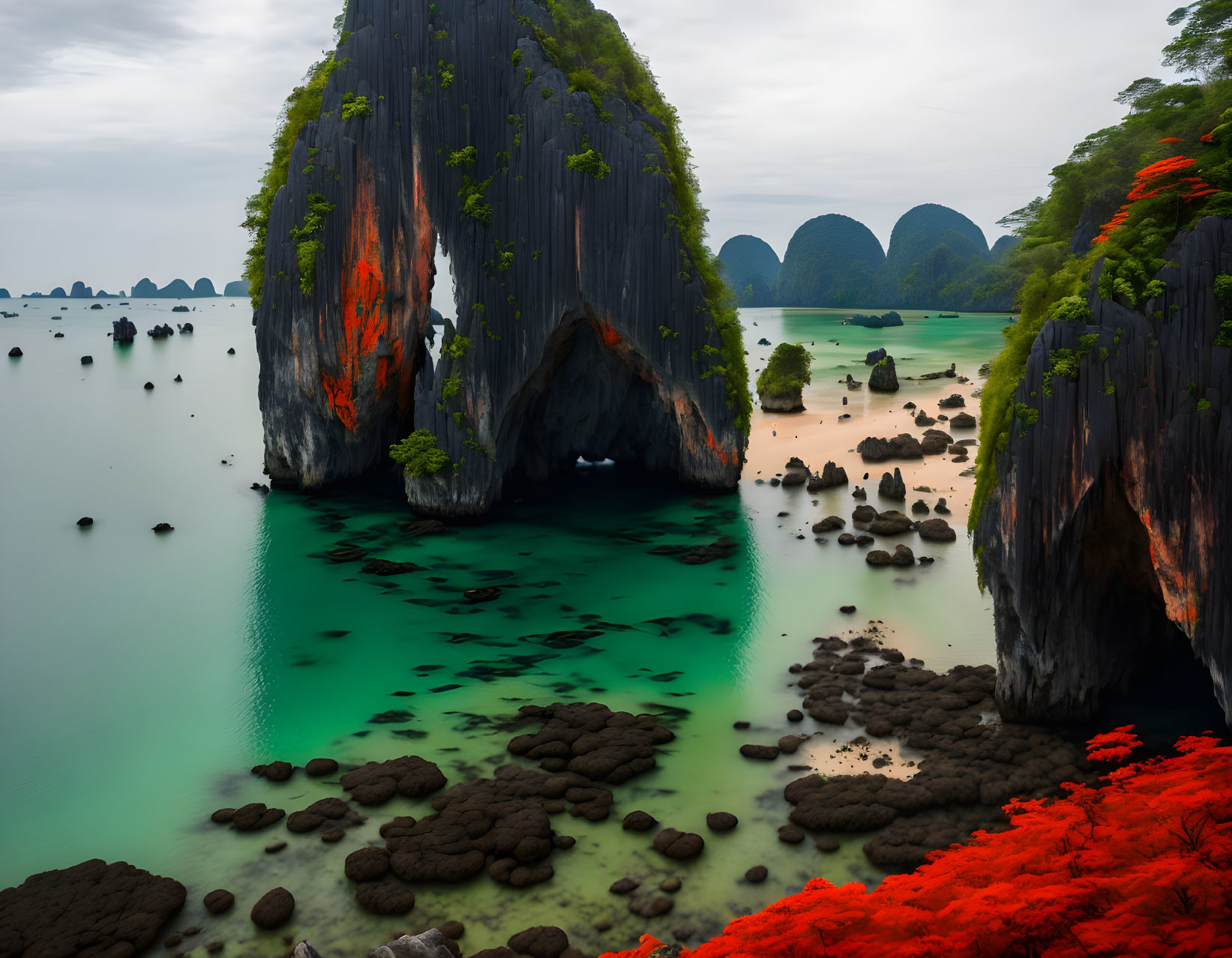 Tranquil Tropical Bay with Karsts, Cave, and Red Foliage