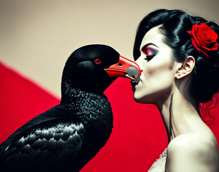 Woman with red flower kissing black bird on red background