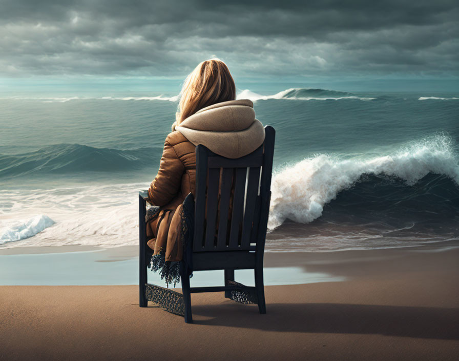 Person in Brown Jacket Sitting on Chair Facing Stormy Beach Sky