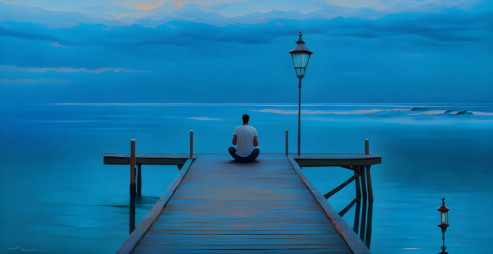 Person sitting on wooden pier at twilight by calm sea and street lamp