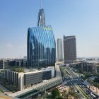 Futuristic cityscape with towering skyscrapers and lush greenery