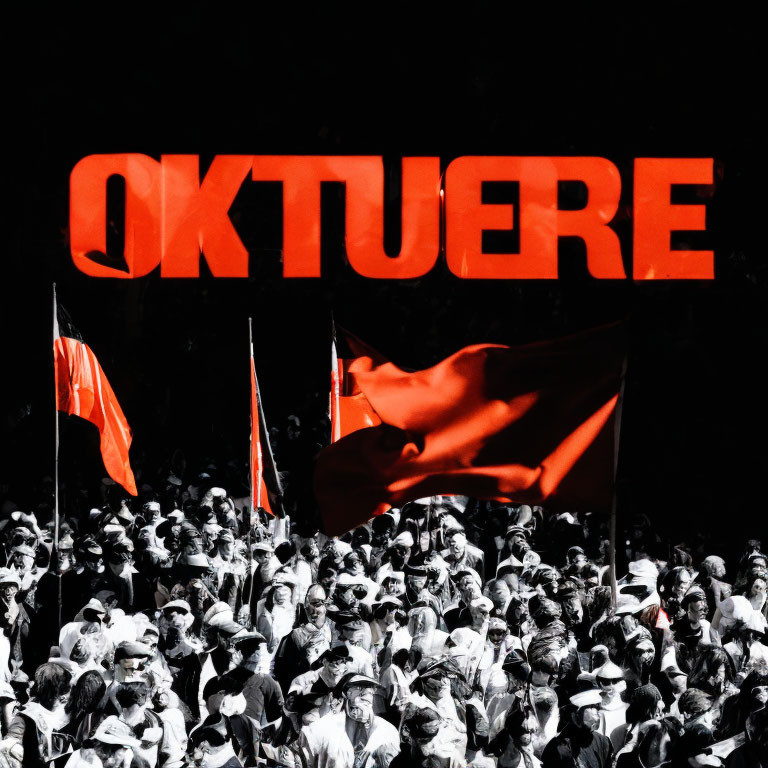 Monochrome crowd with red flags under bold red "OKTUERE" sign