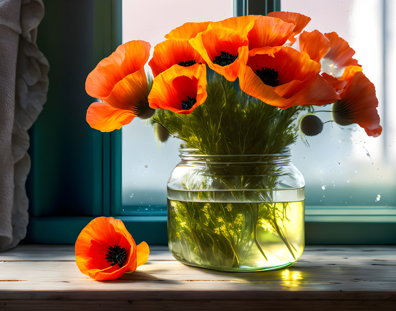 Glass vase with vibrant orange poppies on wooden sill in sunlight