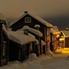 Historic dusk scene: Thatched-roof houses, cobblestones, vintage gas lamps, people