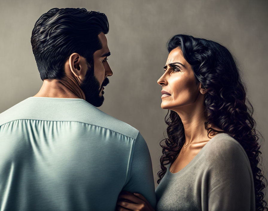 Intense man and woman in serious conversation