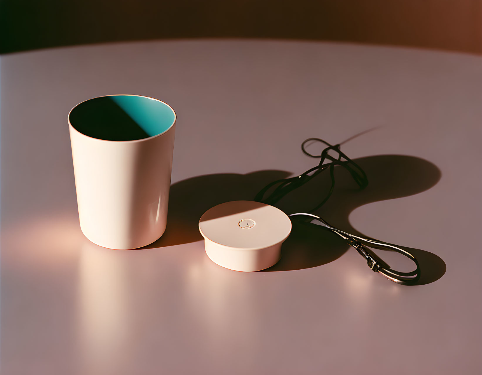 White Cup with Round Lid and Cable on Table with Soft Lighting