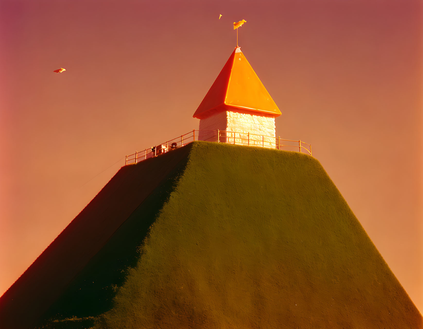 Surreal conical hill with vibrant colors and people at summit