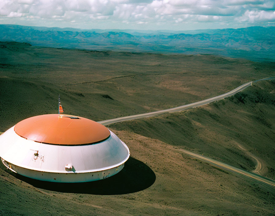 Unique UFO-Shaped Building in Desert Landscape