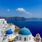 Whitewashed Buildings and Blue Domes in Santorini Greece