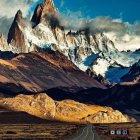 Majestic mountain range with sharp peaks in golden light over serene landscape