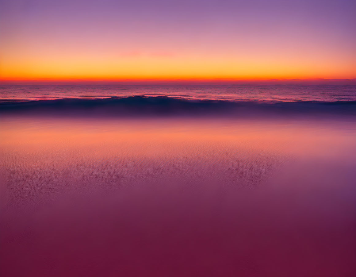 Tranquil Sunset Ocean Horizon with Purple and Orange Gradient