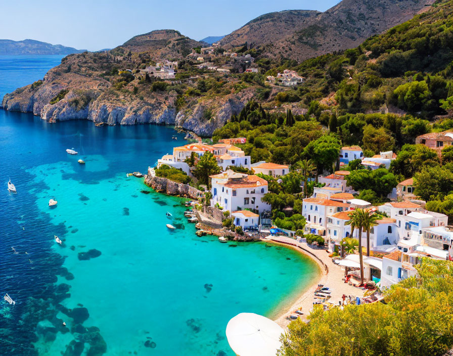 Coastal Village: White Buildings, Turquoise Sea, Boats, Beach