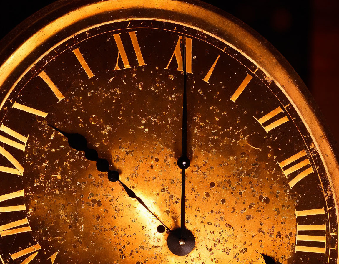 Antique Gold Clock Face with Roman Numerals at 10:10 and Water Droplets