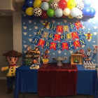 Colorful Balloons and Golden Ornaments in Festive Table Display