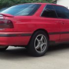 Classic Red Muscle Car with Racing Number 40 and Rear Spoiler