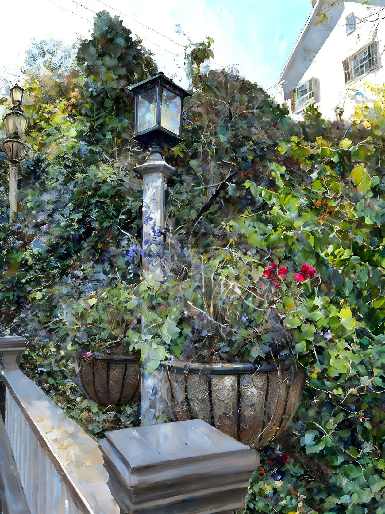 Ornate lamp post near lush greenery and flowers