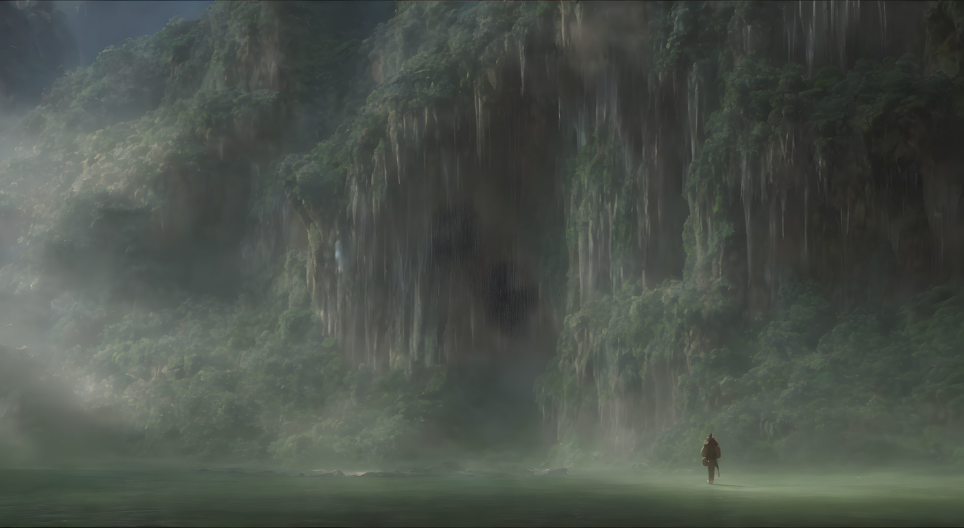 Solitary figure at misty waterfall with lush cliff faces