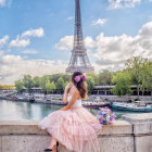 Woman in Pink Dress and Hat at Eiffel Tower with River and Sky