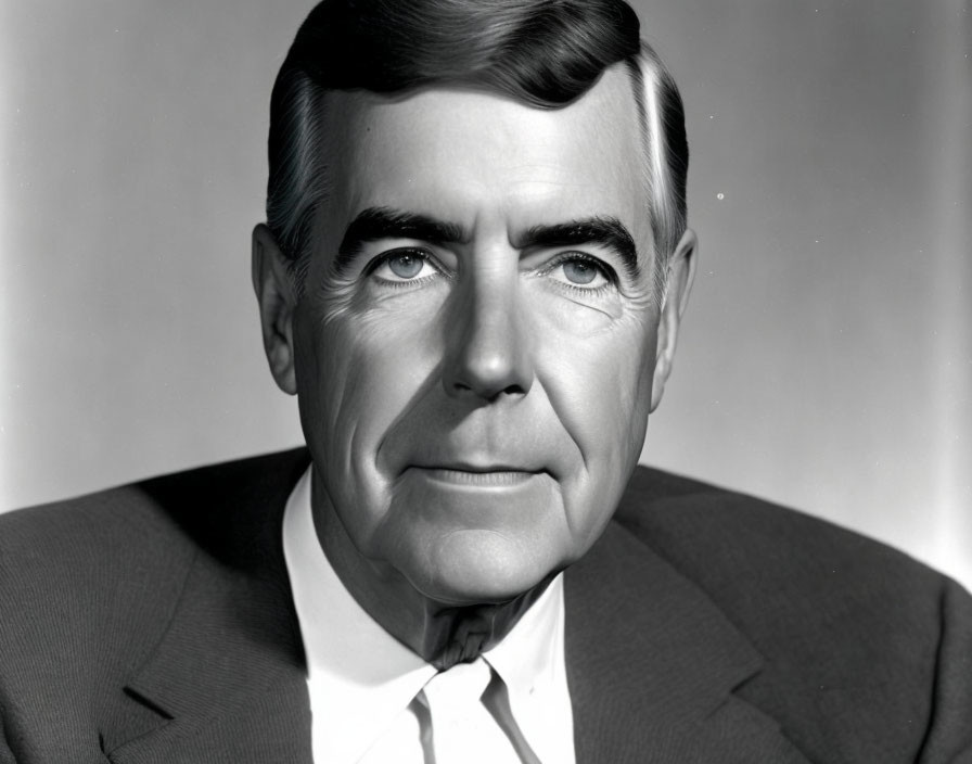 Monochrome portrait of mature man in suit and tie