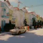 White ornate buildings and dome structures in a fantastical cityscape with vegetation, under warm light.