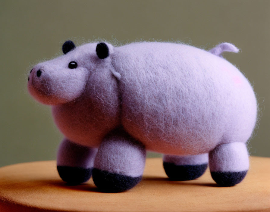 Purple Felted Hippopotamus on Wooden Surface