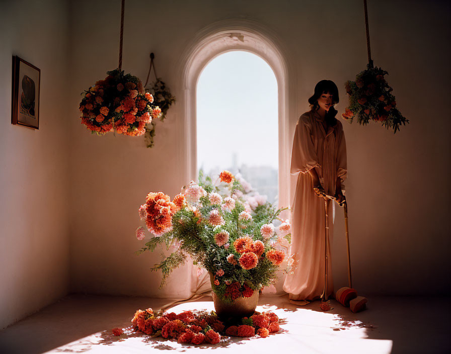 Woman in elegant attire standing in sunlit room with lush floral arrangements