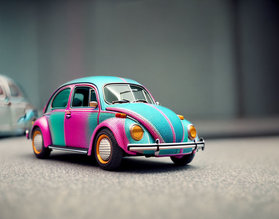 Colorful Polka-Dotted Volkswagen Beetle Toy Car on Street Background