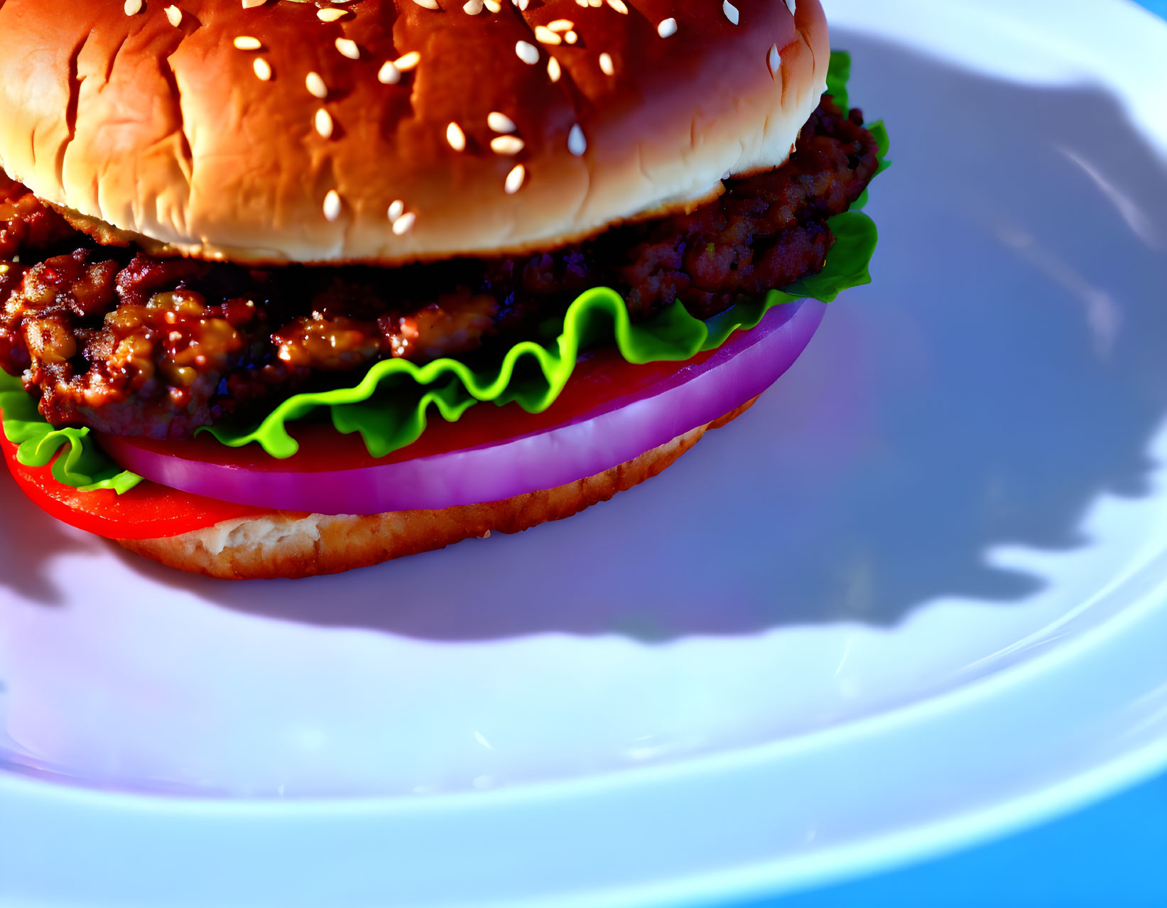 Succulent hamburger with lettuce, tomato, onion on sesame seed bun