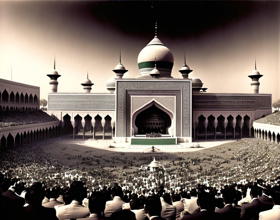 Crowd outside grand mosque with green dome and minarets in sepia tone