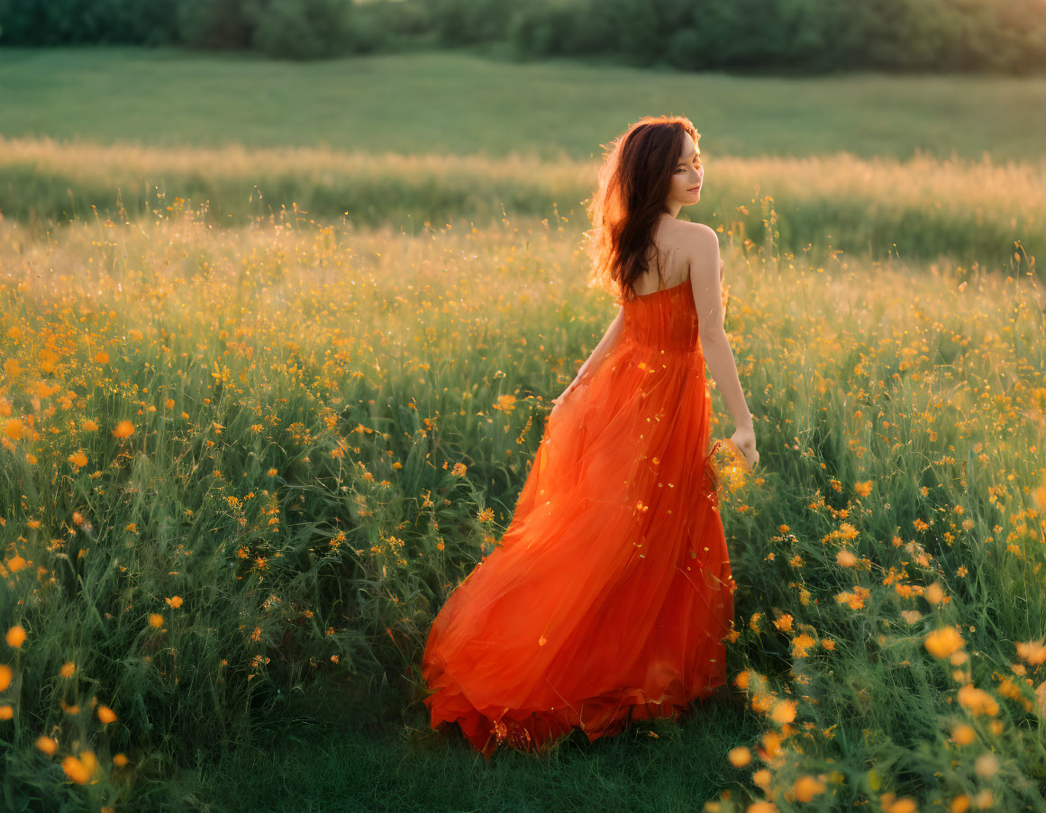 Woman in Orange Dress Surrounded by Yellow Flowers and Greenery