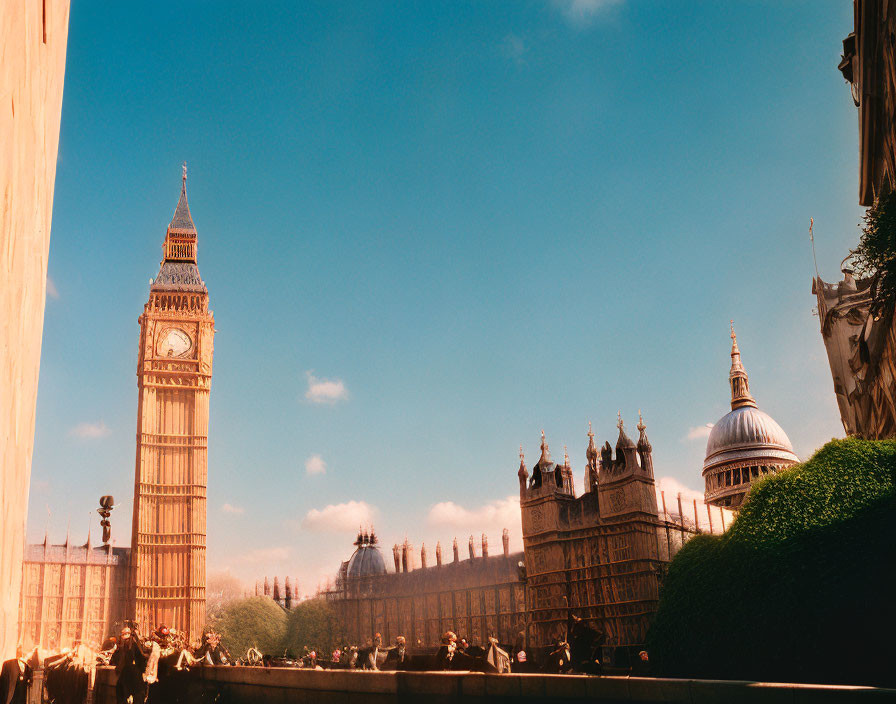 Iconic Big Ben and Houses of Parliament under clear blue sky with people walking.