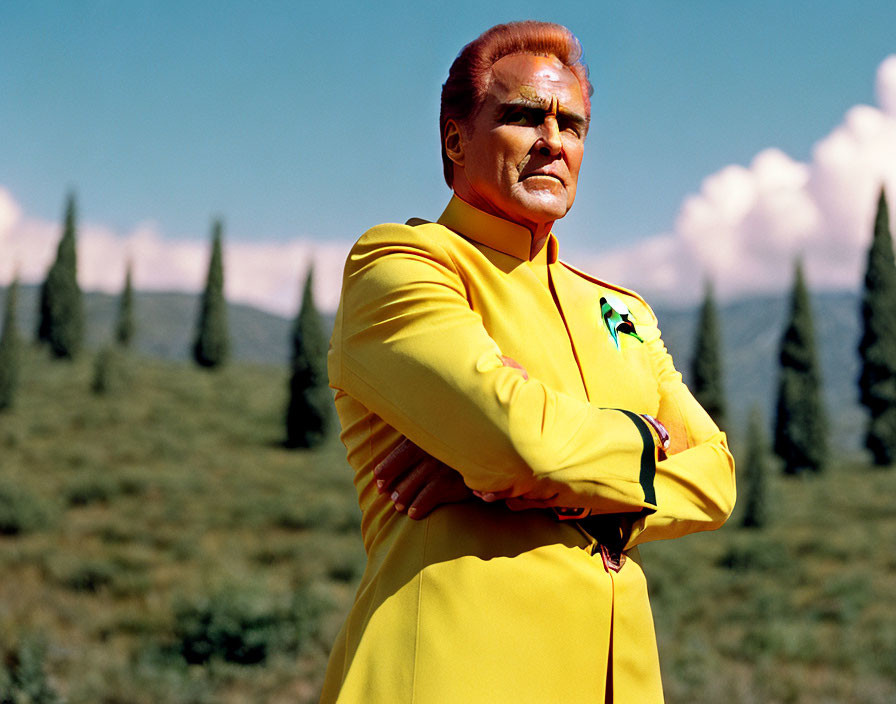 Orange-Haired Individual in Yellow Uniform with Green Emblem Outdoors