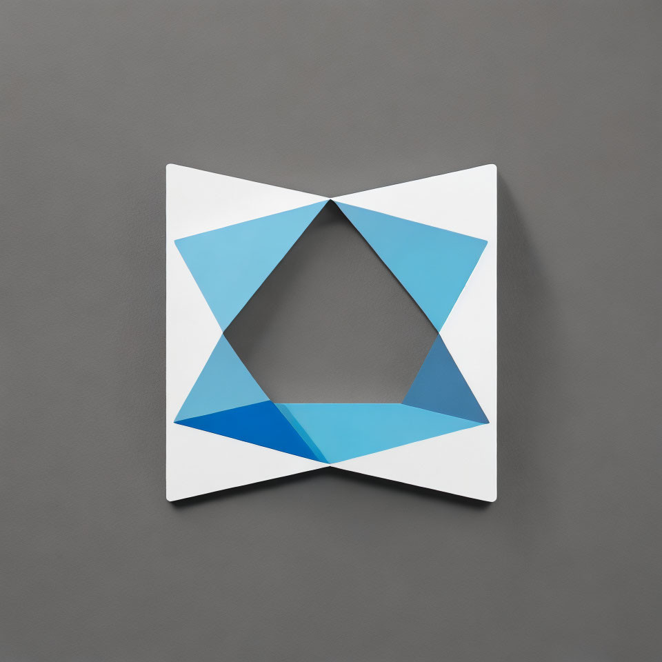 Geometric paper art: 3D optical illusion with light and dark blue triangles