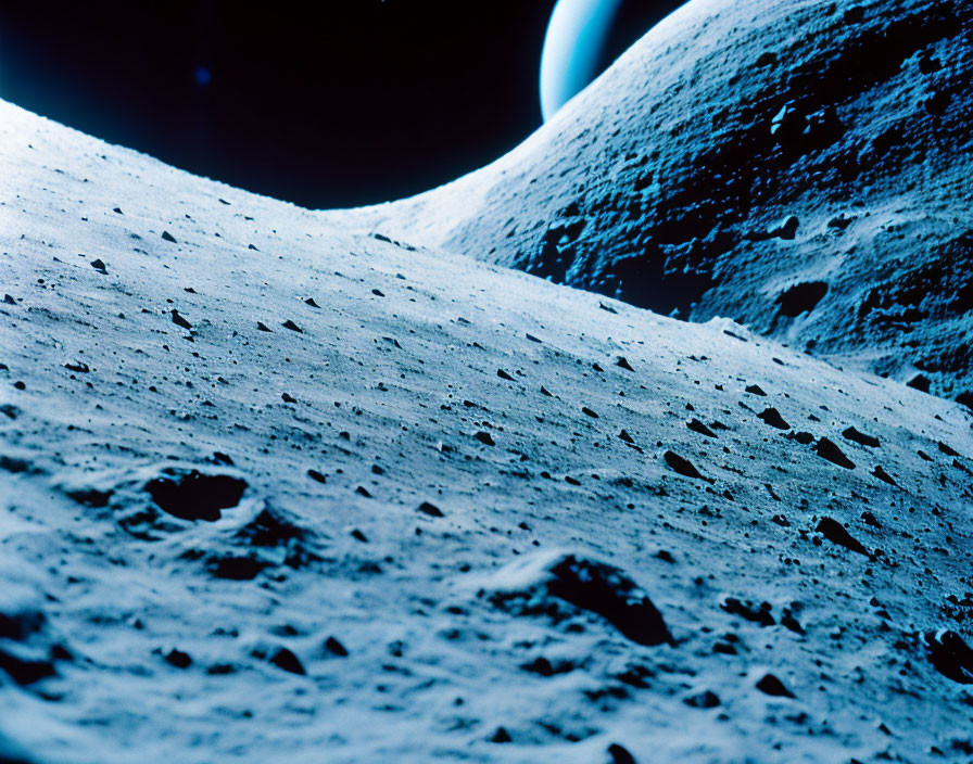 Rocky Lunar Landscape with Earth's Curved Edge in Background