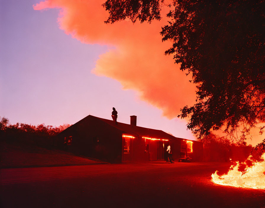 Pink Clouds Sunset Scene with House and Fire