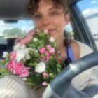 Illustrated portrait of woman with flowers, blanket, bouquet, and pocket watch